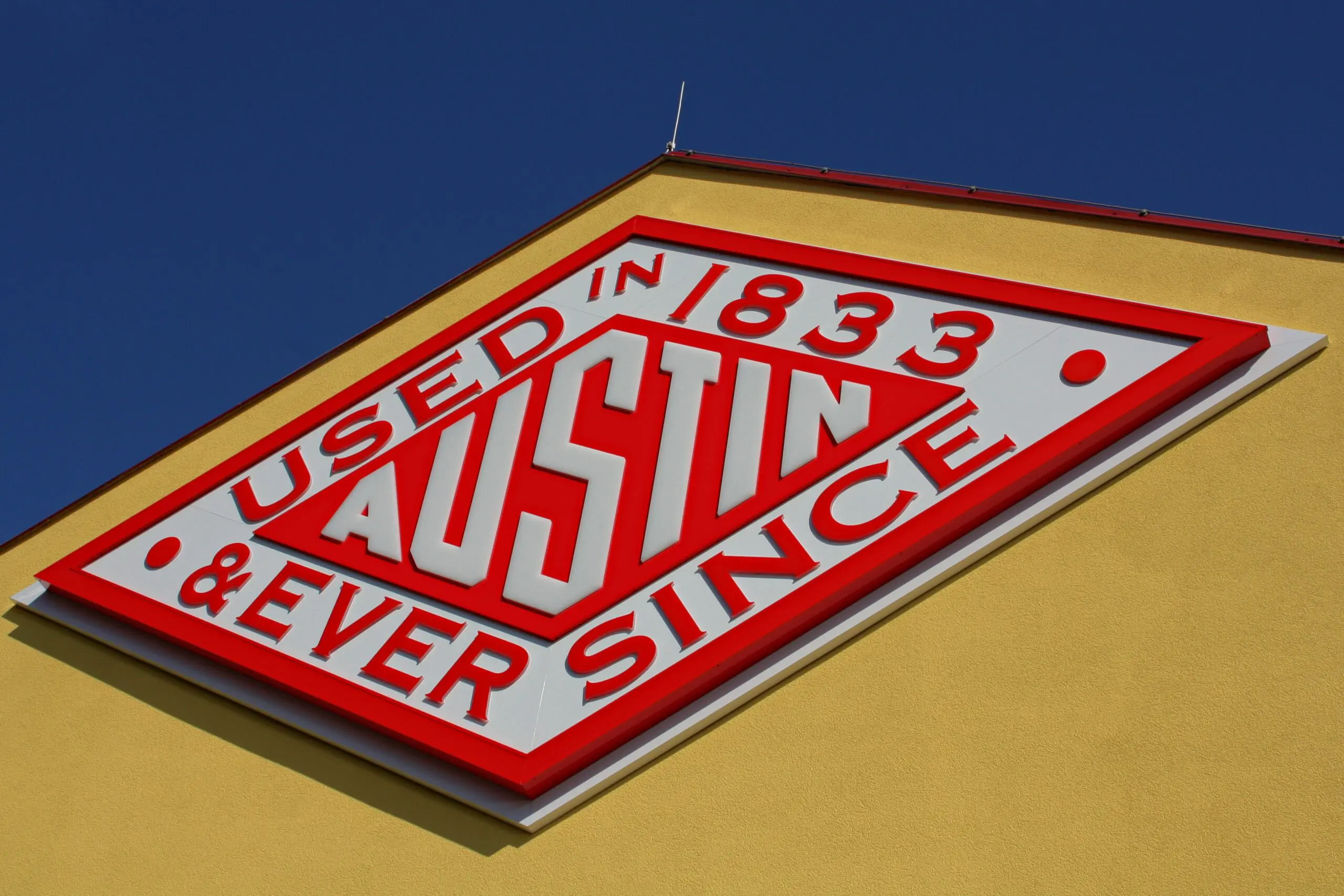 Austin Powder logo on side of building