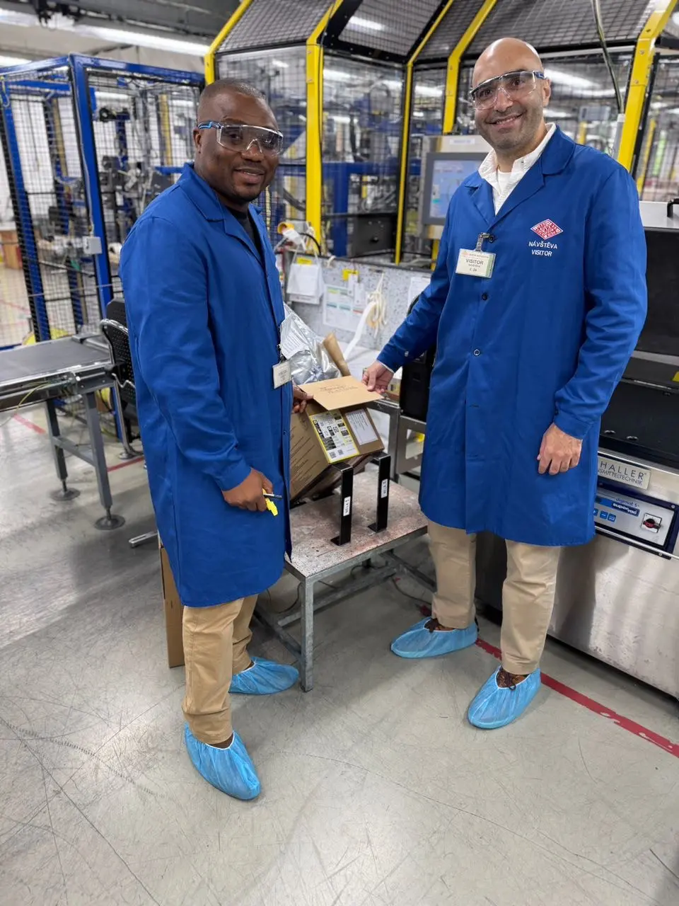 The Box being signed inside to mark first delivery to SL market